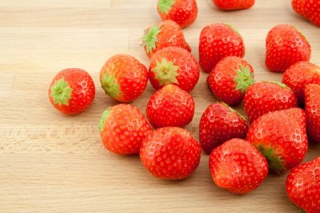 Red strawberries on the wood backgroundの写真素材