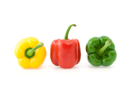 Yellow, red and green paprika on the white backgroundの写真素材