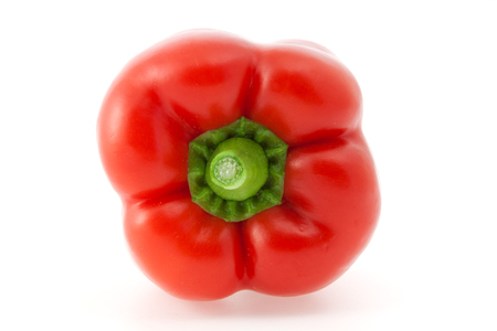 Red organic paprika on the white backgroundの写真素材