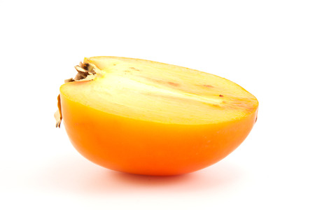 Orange fresh organic persimmon on white backgroundの写真素材