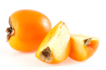 Orange fresh organic persimmon on white backgroundの写真素材