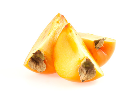 Orange fresh organic persimmon on white backgroundの写真素材