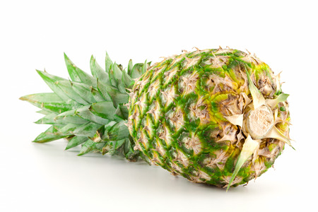fresh organic ripe pineapple on white backgroundの写真素材