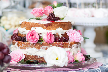 biscuit cake with fruit and roses