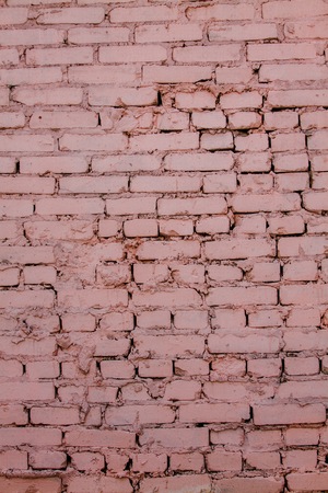 old orange brick wall as backgroundの写真素材