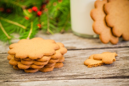 Christmas gingerbread cookies on a rustic wooden backgroundの写真素材