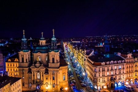 View of prague rooftops with the blue illuminated spires  in Old Town Prague, Czech Republichのeditorial素材
