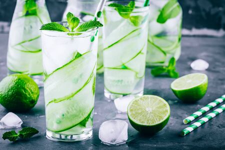 Ice cold and refreshing detox water cucumber and mint in a glass jarの写真素材