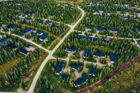 Aerial view of rural village, residential area with houses or cottages in Finlandの写真素材