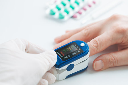 Pulse Oximeter finger digital device to measure oxygen saturation in blood and pulse rate.の写真素材