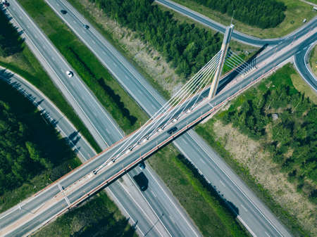 Aerial view of bridge over highway road in Finland. Beautiful summer landscape.の写真素材