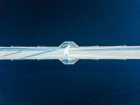 Aerial view of Ylisto footbridge over blue lake in Finland, Jyvaskyla. Beautiful summer landscape.の写真素材