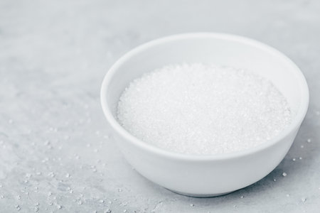 White sugar bowl on gray stone backgroundの写真素材