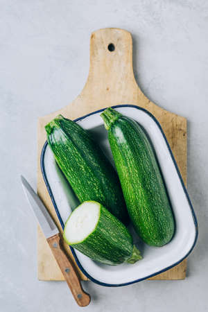 Zucchini. Fresh raw organic zucchini ready for cooking, top view with copy spaceの写真素材