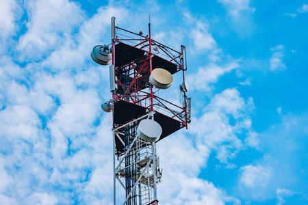 Aerial drone view of 5G telecommunication tower. Cell phone tower. Base transceiver station....