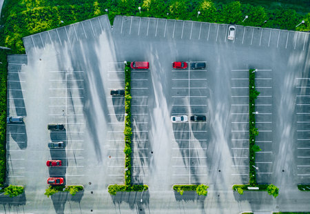 Aerial view of cars at car park, almost empty parking lots.の写真素材