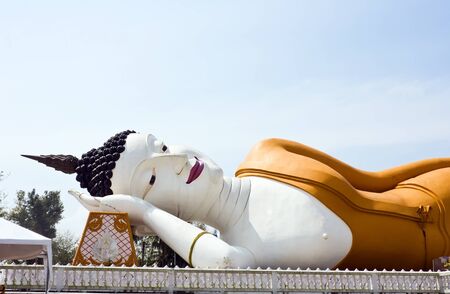 Reclining Buddha with sky in Nakhornsrithammarat province, south of Thailandの写真素材