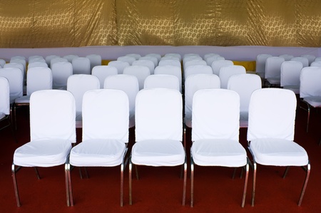 row of chair in meeting room 