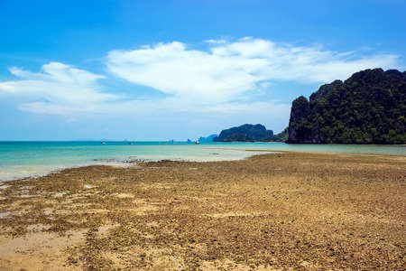 Rock and sand at Ao Num Mao pier in Krabiの写真素材