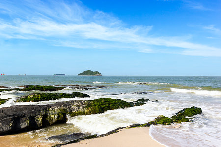Green rock on Samila beach with white sand Songkhla Thailandの写真素材