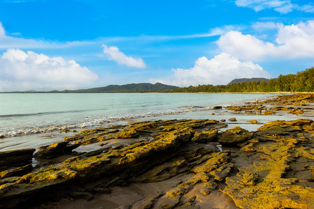 Rock with blue sky on Khao Lak beach in Phang-nga Thailandの写真素材
