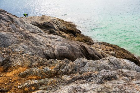 Rock at Nai Han Beach with blue sky in summer Phuket Thailandの写真素材