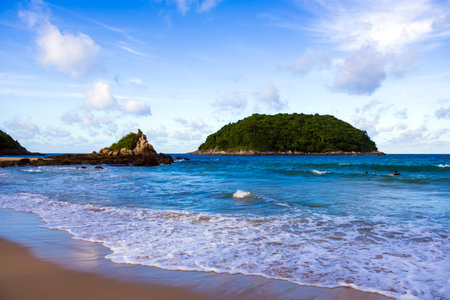 Sea view at Yanui Beach with rock and blue sky in Phuket Thailandの写真素材