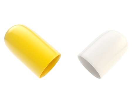 Copyspace medicine capsule pill case opened in two glossy halfs white and yellow isolated