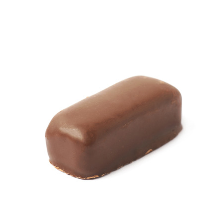 Chocolate coated candy bar isolated over the white backgroundの写真素材