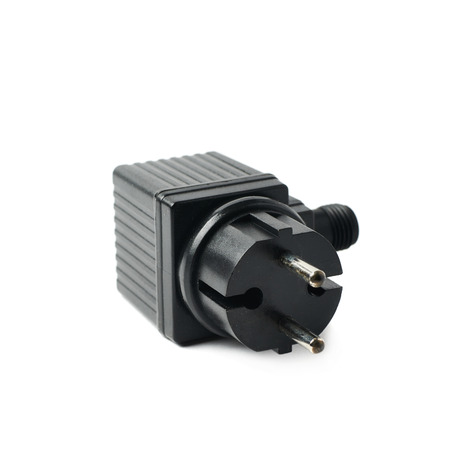 Black plastic electric adapter isolated over the white background