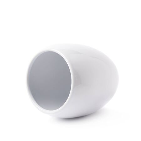 White glazed ceramic cup isolated over the white backgroundの写真素材