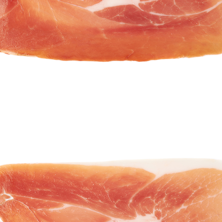 Prosciutto copyspace background composition with a ham as decorational borders isolated over the white backgroundの写真素材