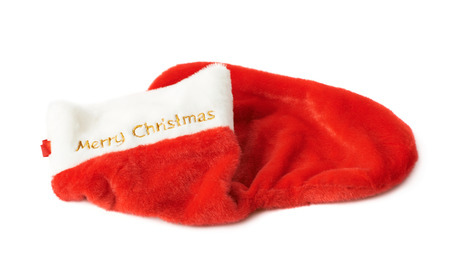 Christmas stocking as a sock shaped red bag, composition isolated over the white backgroundの写真素材