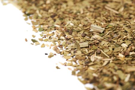 Surface covered with dry mate tea leaves as a copyspace background compositionの写真素材