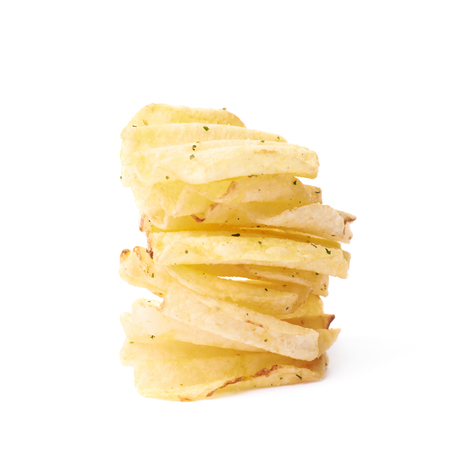 Stack pile of seasoned potato chips crisps, composition isolated over the white backgroundの写真素材