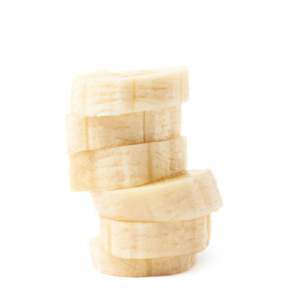 Stack pile of banana slices, composition isolated over the white backgroundの写真素材