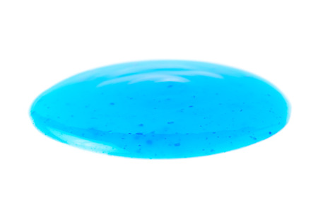Round spill stain of sauce dressing isolated over the white backgroundの写真素材