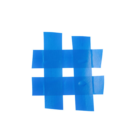 Hashtag number symbol made of insulating tape isolated over the white backgroundの写真素材