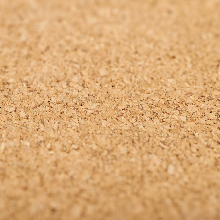 Cork textured surface with a shallow depth of field as a background compositionの写真素材