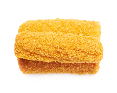 Pile of breaded crab stick snacks isolated over the white background