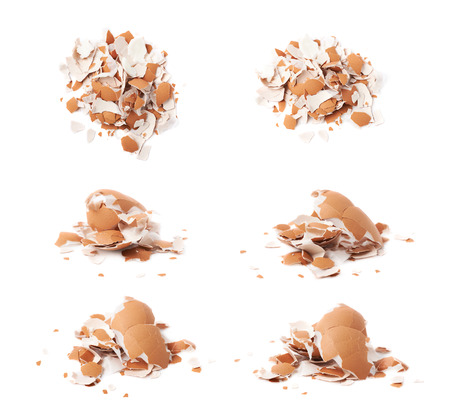 Pile of cracked egg shells isolated over the white background, set of six different foreshortenings
