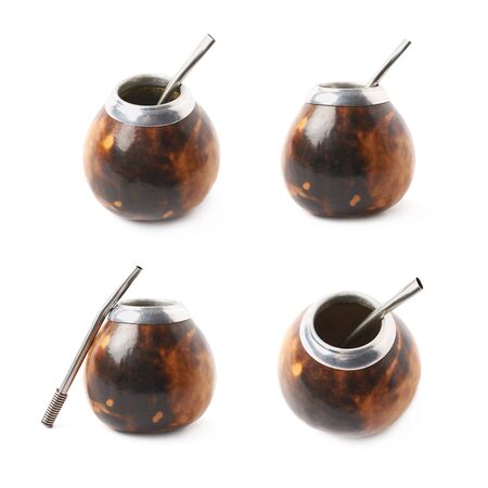 Calabash mate gourd with a bombilla drinking straw inside it, composition isolated over the white background, set of four different foreshorteningsの写真素材