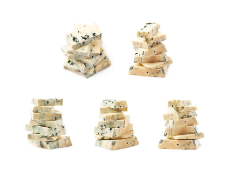 Pile of blue cheese slices isolated over the white background, set of five different foreshorteningsの写真素材