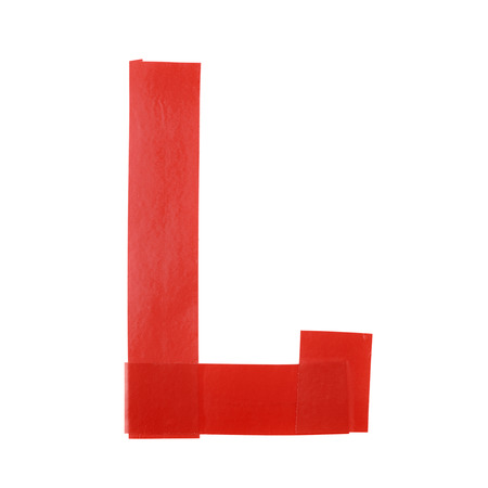 Letter L symbol made of insulating tape pieces, isolated over the white backgroundの写真素材