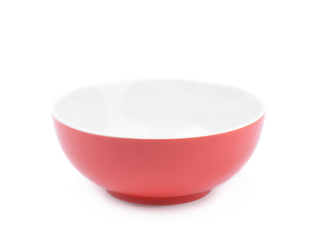 Red and white empty ceramic bowl isolated over the white backgroundの写真素材