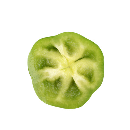 Slice of a green bell pepper isolated over the white backgroundの写真素材
