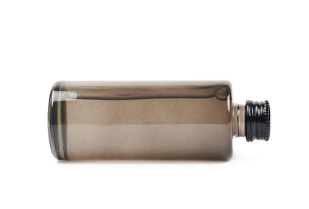 Black glass bottle vial isolated over the white backgroundの写真素材