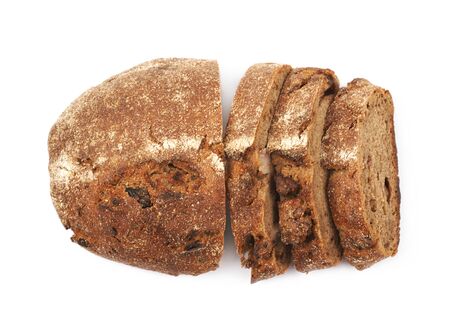 Sliced loaf of the brown bread isolated over the white background
