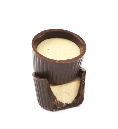 Composition of two chocolate confection candies isolated over the white backgroundの写真素材