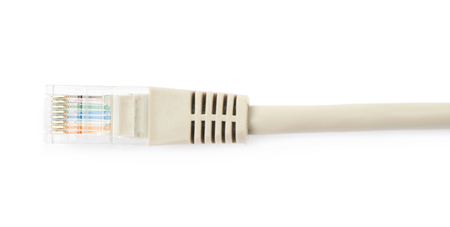 Close-up fragment of an ethernet cable isolated over the white background